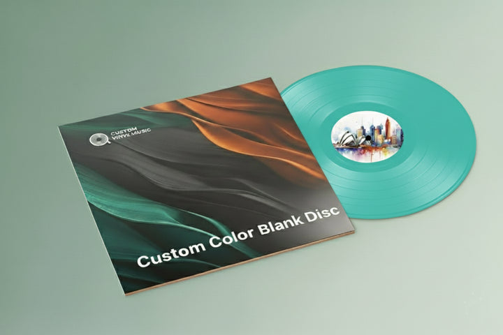 Turquoise vinyl record and cover on a light green background