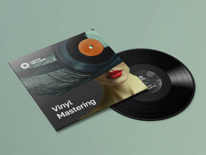 Vinyl record with a cover featuring a woman's face and 'Vinyl Mastering' text on a green background